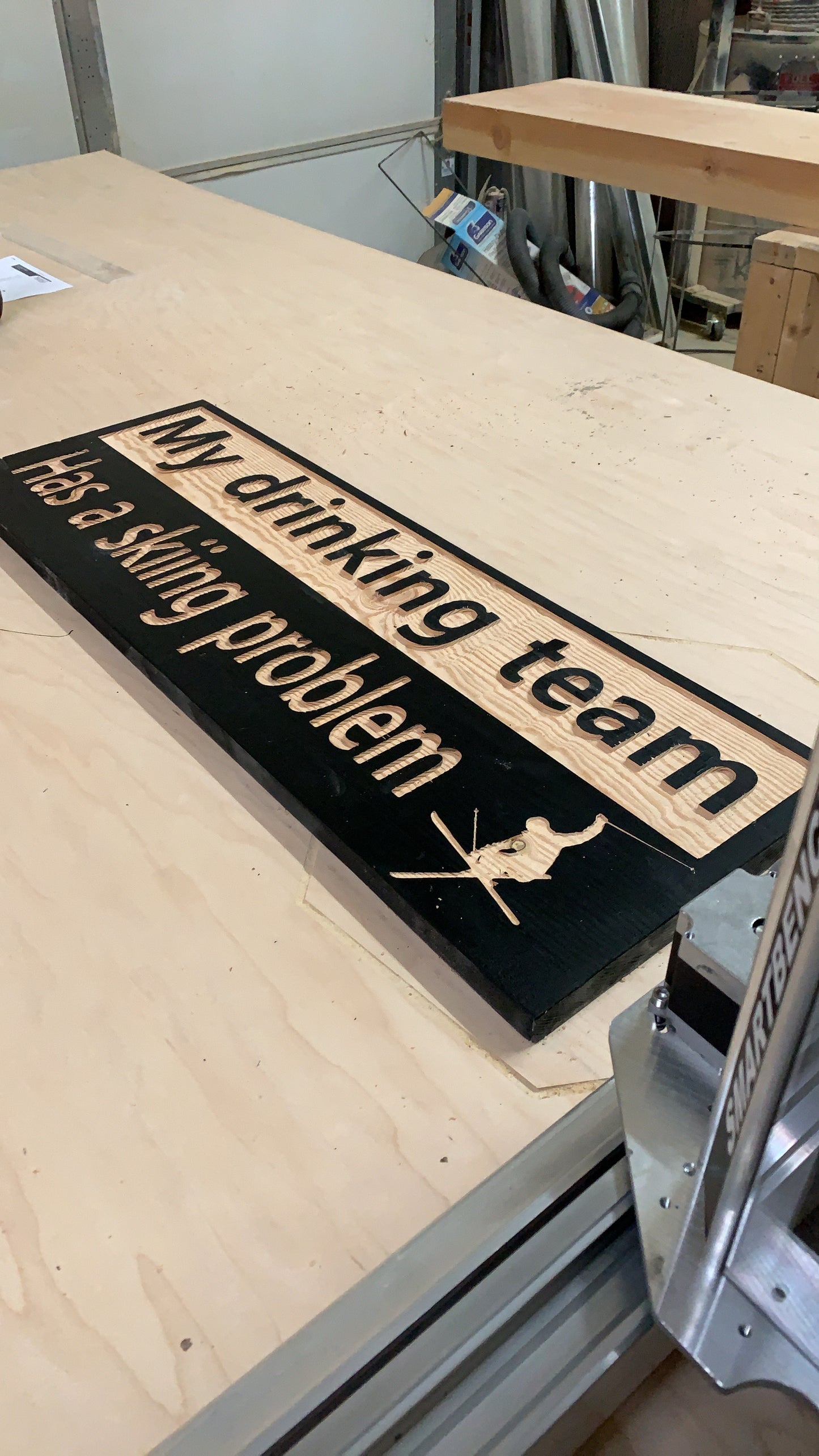 My drinking team has a skiing problem wood carved sign