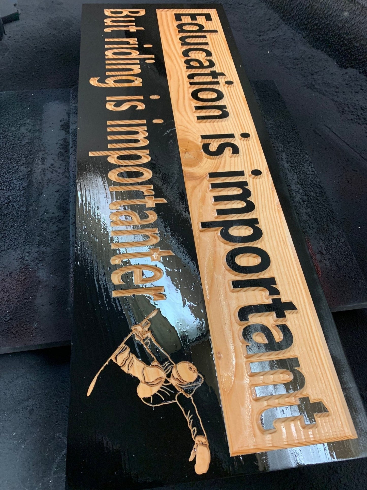 "Education is important But riding is importanter" sign - Advent Wood Products