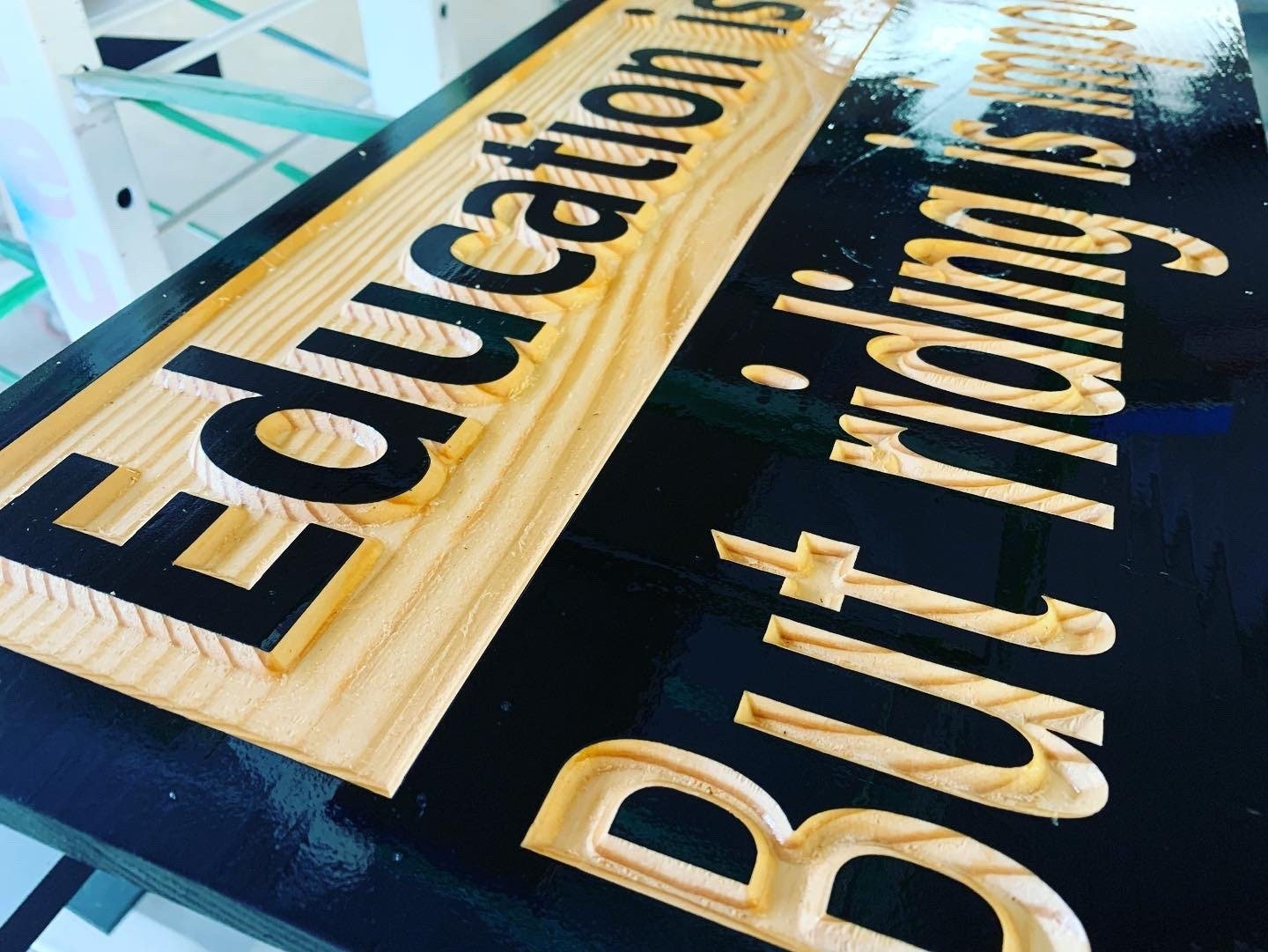 "Education is important But riding is importanter" sign - Advent Wood Products