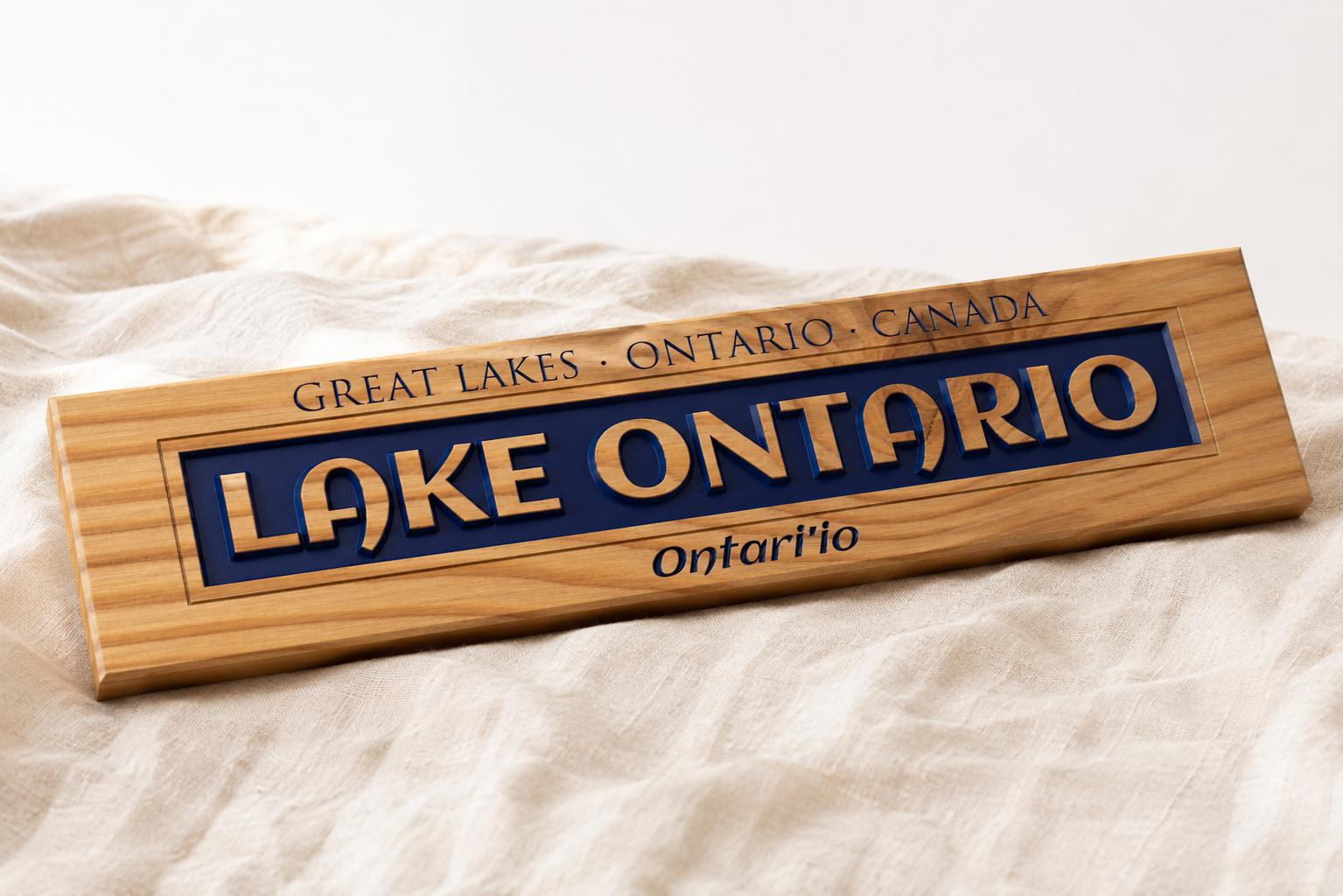 Lake Ontario relief carved pine plank sign - hero shot on linen