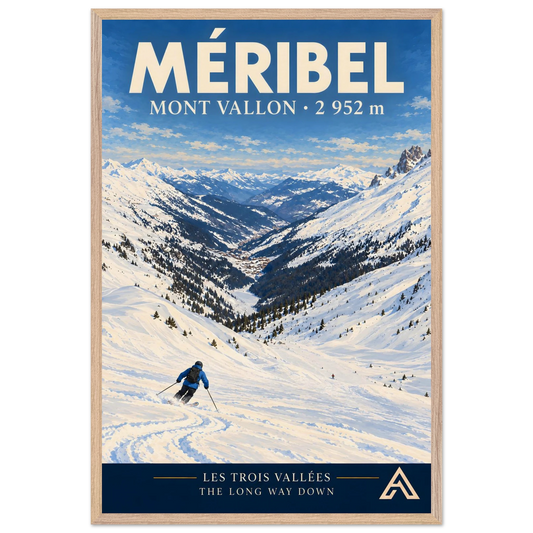 Méribel Mont Vallon art print in a Natural Oak frame, 60x90 cm, showing a blue-jacketed skier descending a snowy slope towards a long Alpine valley.