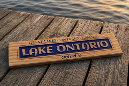 Lake Ontario pine plank sign on weathered dock boards at golden hour