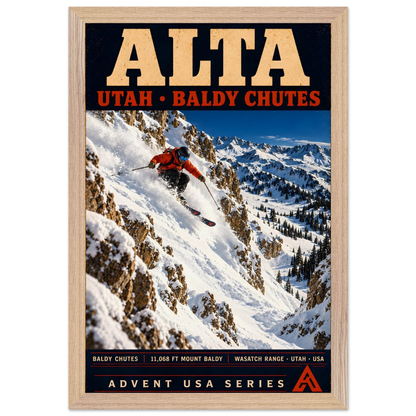 Alta art print in a Natural Oak frame, showing an orange-jacketed skier descending deep powder between rocky walls above a snowy mountain valley.