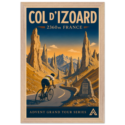 Col d’Izoard art print in a Natural Oak frame, showing a cyclist in a white world champion jersey on the winding road through golden Alpine rock spires.