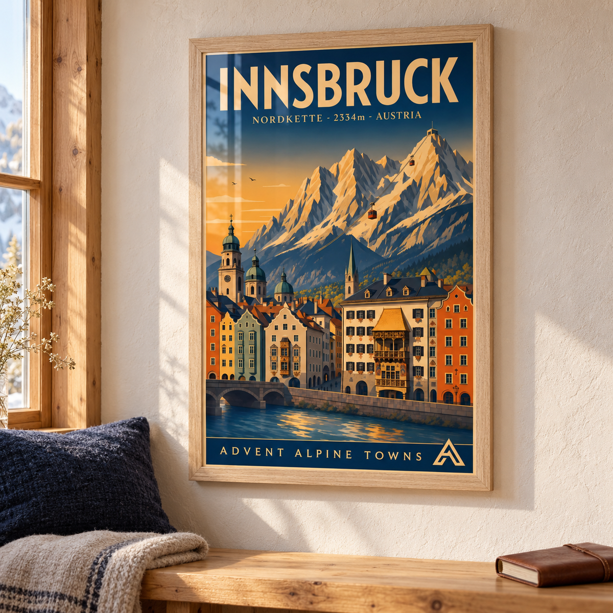 Innsbruck art print in a Natural Oak frame above a timber bench with wool cushions, showing colourful riverfront buildings beneath the Nordkette mountains.