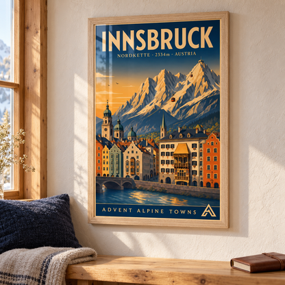 Innsbruck art print in a Natural Oak frame above a timber bench with wool cushions, showing colourful riverfront buildings beneath the Nordkette mountains.