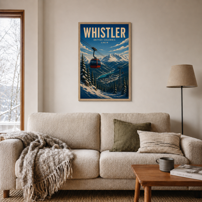 Whistler framed art print displayed above a sofa beside a window.