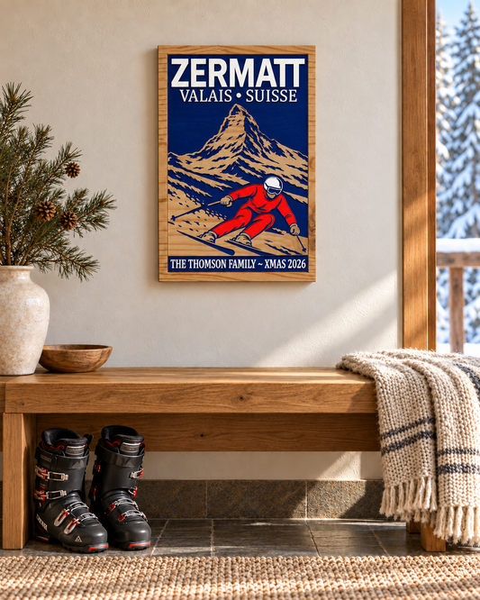 Room render showing a 16 x 24 inch personalised Zermatt carved wood sign above a wooden bench, with ski boots and a snowy window.